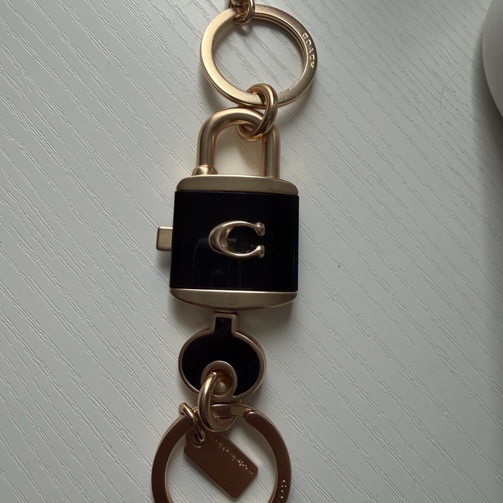Coach Black and Gold Padlock Key Holder